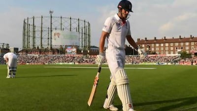 Alastair Cook walks off dejected after being dismissed by Australia at The Oval yesterday. The match ended in a controversial draw. Philip Brown / Reuters