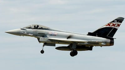 A Eurofighter Typhoon fighter aircraft produced by BAE Systems at the air show. Andy Rain / EPA