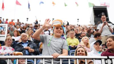 Spectators enjoy the atmosphere before the opening ceremony at Alexander Stadium. Getty