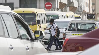 Parents said they would like to see a greater police presence, safe walkways and additional parking near schools in Mussaffah, such as at Sunrise English School, pictured. Mona Al Marzooqi / The National