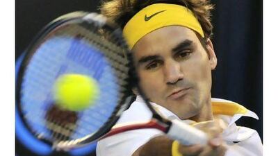 A reader argues with the description of Roger Federer as the greatest player ever. Paul Crock / AFP