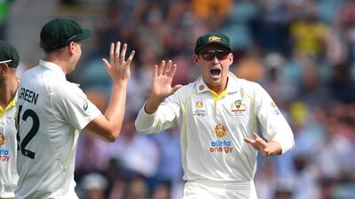 Marnus Labuschagne celebrates after running out Rory Burns of England for a duck. EPA