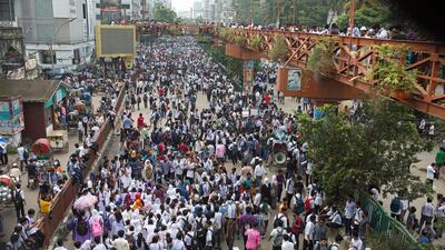 Hundreds of Bangladeshi students shout slogan and block roads during a rally demanding safe roads on the seventh consecutive day of protests, in Dhaka city, Bangladesh. EPA / MONIRUL ALAM