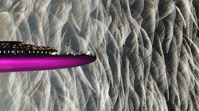 People watch New Year’s Day celebration fireworks at the Marina Bay Sands hotel in Singapore. Reuters
