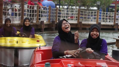 Girls ride in Lego-themed boats at Legoland Malaysia. Rahman Roslan / Bloomberg