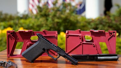 Parts of a ghost gun kit on display at a White House event in Washington. Reuters