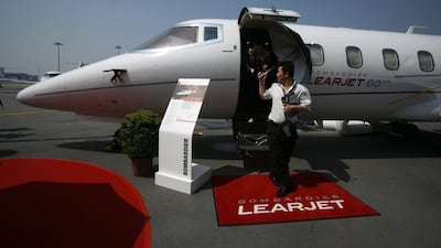 Visitors tour a Bombardier Learjet at the Asian Aerospace Expo in Hong Kong. Bobby Yip / Reuters