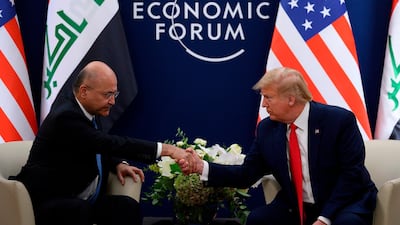 US President Donald Trump speaks with Iraqi President Barham Salih during a bilateral meeting at the World Economic Forum in Davos, Switzerland. AFP