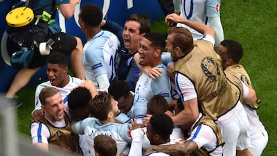 England players celebrate. Philippe Huguen / AFP