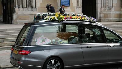 The hearse carrying the body of journalist Lyra McKee. PA via AP