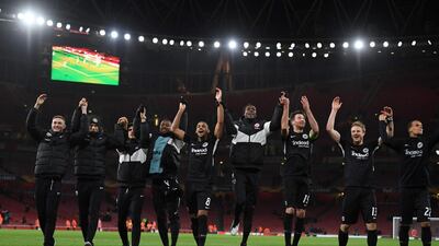 Eintracht Frankfurt players celebrate at the final whistle. AFP