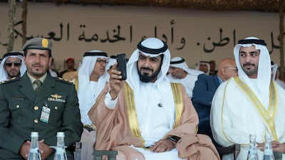 Sheikh Zayed bin Sultan bin Khalifa, right, and Sheikh Diab bin Tahnoon bin Mohamed, attend the graduation ceremony. Mohamed Al Hammadi / Crown Prince Court - Abu Dhabi