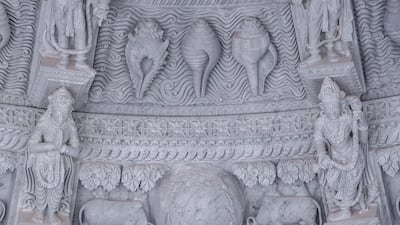 No pillar is the same with statues representing deities and spiritual gurus moulded into the ceiling. Victor Besa / The National