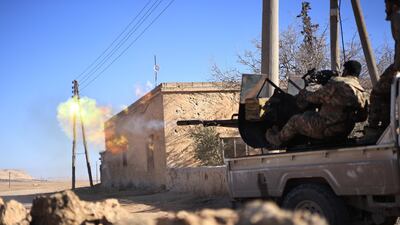 Syrian National Army forces clash with Kurdish militias near Manbij in Syria. Anadolu via Getty Images