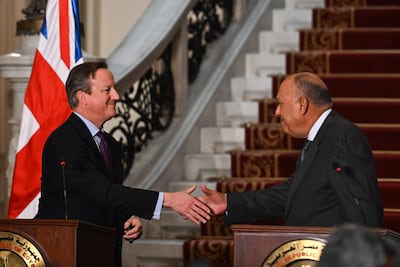 Britain's Foreign Secretary David Cameron and Egypt's Foreign Minister Sameh Shoukry attend a press conference in Cairo, where they discussed ways of curbing migration. EPA