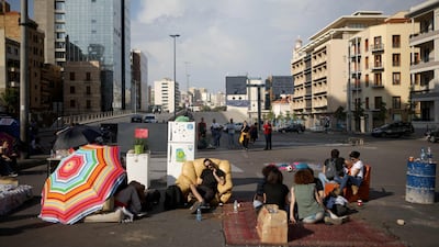 Before the Hezbollah and Amal supporters attacked, Lebanese anti-government protesters had blocked the Ring road bridge that crosses the heart of Beirut. AFP
