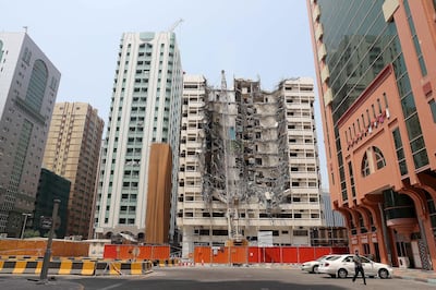 The demolition of older buildings is a regular occurrence in the Tourist Club area of Abu Dhabi. Pawan Singh / The National