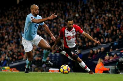 Vincent Kompany, left, is a derby hero and will be crucial in Manchester City's bid to keep Romelu Lukaku quiet. Andrew Yates / Reuters