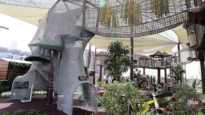 The outdoor playground also features a treehouse with viewing decks, slides and hanging bridges