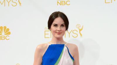Michelle Dockery wears Rosie Assoulin to the 2014 Primetime Emmy Awards. EPA