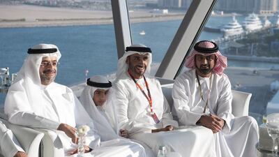 Sheikh Ammar bin Humaid Al Nuaimi, Crown Prince of Ajman, right, Sheikh Nahyan bin Zayed, Chairman of the Board of Trustees of Zayed bin Sultan Al Nahyan Charitable and Humanitarian Foundation, second right, and Sheikh Sultan bin Mohammed Al Qasimi, Crown Prince of Sharjah, left, attend a reception ahead of the Abu Dhabi Grand Prix. Mohamed Al Suwaidi / Crown Prince Court — Abu Dhabi