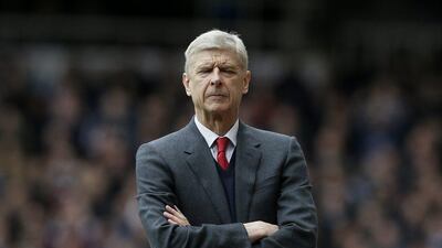 Arsenal manager Arsene Wenger closes his eyes during his team's Premier League match against West Ham last weekend. Tim Ireland / AP / April 9, 2016