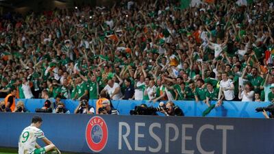 Republic of Ireland's Robbie Brady celebrates with fans after scoring the winning goal against Italy. REUTERS/Carl Recine