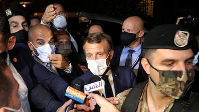 French President Emmanuel Macron talks to journalists as he leaves the home of Fairouz, one of Arab world's most famed singers, after visiting her in Rabieh, Lebanon, on August 31, 2020. Reuters