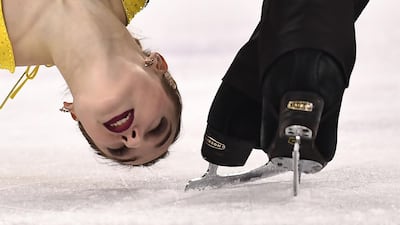 Russia's Kristina Astakhova and Russia's Alexey Rogonov compete in the pair skating free skating of the figure skating event. Aris Messinis / AFP