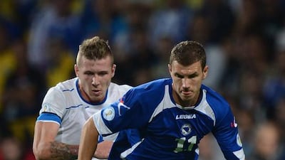 Edin Dzeko has been a big reason for Bosnia's progression onto the world stage. Jamie McDonald / Getty Images