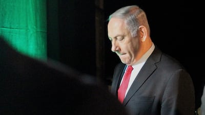 Prime Minister Benjamin Netanyahu leaves the Muni World conference in Tel Aviv on February 14, 2018. Mr Netanyahu said today his government was "stable" and criticised the police investigation against him after detectives recommended his indictment for corruption, prompting calls for him to resign. Jack Guez / AFP