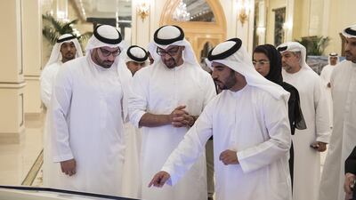 Sheikh Mohammed bin Zayed, Crown Prince of Abu Dhabi Deputy Supreme Commander of the Armed Forces, inspects a Dh 12 billion worth plan to develop the southern part of Yas Island, from Miral Asset Management Organisation, during a Sea Palace barza. Seen with Mohammed Al Mubarak, Chairman of Abu Dhabi Tourism and Culture Authority (L). Hamad Al Kaabi / Crown Prince Court - Abu Dhabi