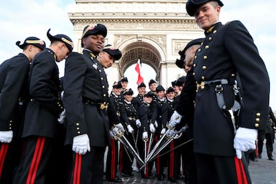 Students of the French military school Polytechnique pose before the start of the annual Bastille Day military parade. AFP