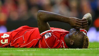 Mario Balotelli of Liverpool shows his frustration during the English Premier League match against Hull City at Anfield on October 25, 2014, in Liverpool, England. Alex Livesey / Getty Images