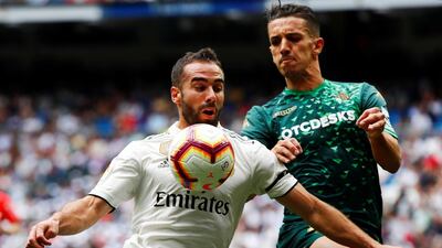 Real Madrid's Dani Carvajal in action with Real Betis' Zouhair Feddal. Reuters