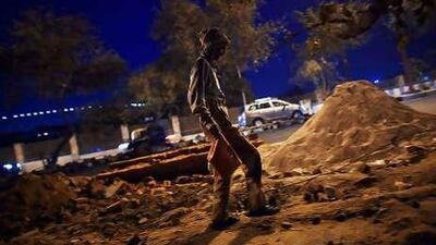 A labourer toils on a site at New Delhi's Nehru Stadium ahead of October's Games. Forty-three have died in building accidents so far.