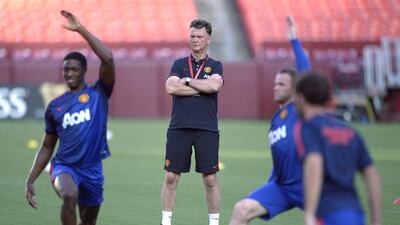 Manchester United manager Louis van Gaal conducts a training session on Monday with the club in Maryland, US. Shawn Thew / EPA / July 28, 2014