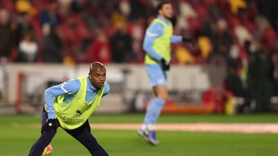 Manchester City's Fernandinho stretches as he warms-up before the match against Brentford. AP Photo