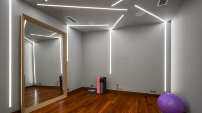 The property has a gym, massage room and yoga studio