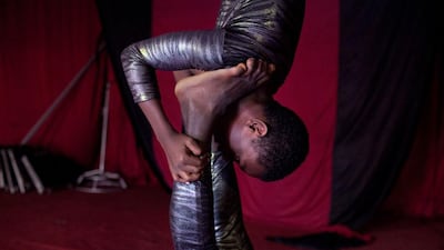Ethiopian performer Abdul Gefar, 14, gets his daily dose of a different perspective.