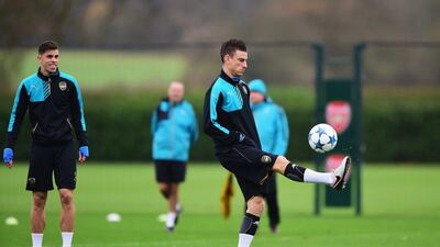 Laurent Koscielny controls the ball during Arsenal’s training session on Tuesday for their Wednesday Champions League contest. Dan Mullan / Getty Images