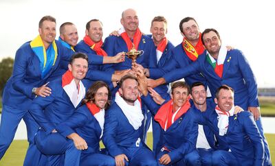 Team Europe after beating the United States 17.5-10.5 in France to win the Ryder Cup in 2018. PA