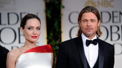 Angelina Jolie and Brad Pitt arrive at the 69th Annual Golden Globe Awards. AP Photo/Chris Pizzello