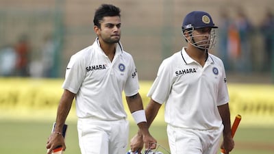 Virat Kohli and MS Dhoni shown during a Test match against New Zealand on September 1, 2012. Aijaz Rahi / AP