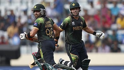 Umar Akmal, left, and his brother Kamran are both Pakistan internationals. Aijaz Rahi / AP Photo