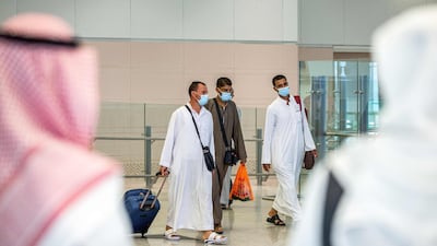 Hajj pilgrims arrive at Jeddah's King Abdulaziz International Airport on July 25, 2020. Saudi Ministry of Hajj and Umra / AFP