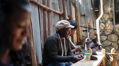 Women work in Nairobi's Korogocho slum creating clothes and accessories for Ethical Fashion Africa. AFP