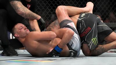 Nate Diaz seals his victory over Tony Ferguson at UFC 279. AP