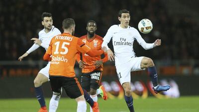 Paris Saint-Germain's Angel Di Maria, right, challenges for the ball with Lorient's Mathieu Peybernes during the French Ligue 1 match in Lorient, western France, Sunday, March 12, 2017. PSG won 2-1. David Vincent / AP Photo