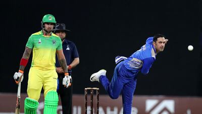 Captain Mohammad Nabi of Balkh bowls at a Paktia Panthers batsman. Chris Whiteoak / The National